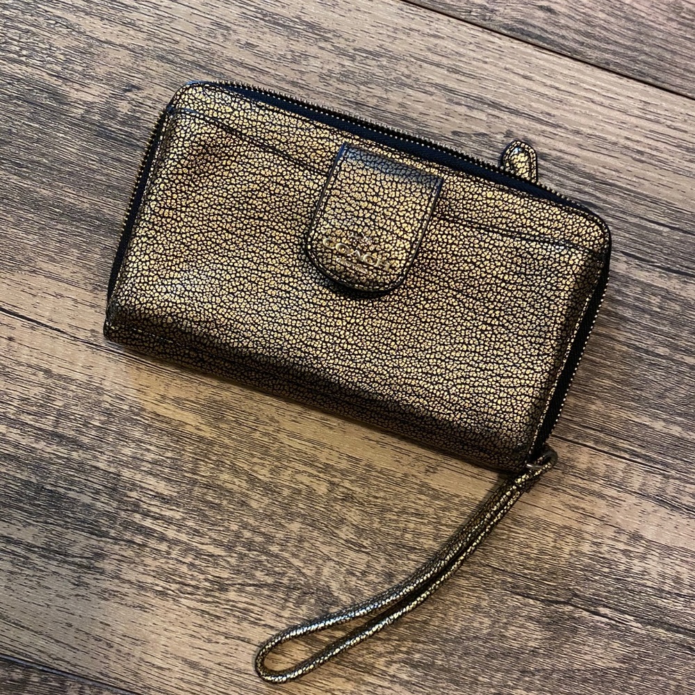Black and gold Coach wallet